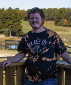man in tie-dyed shirt