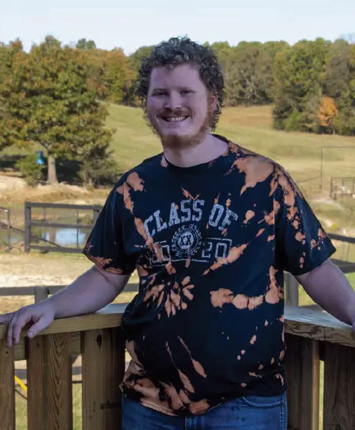 man in tie-dyed shirt