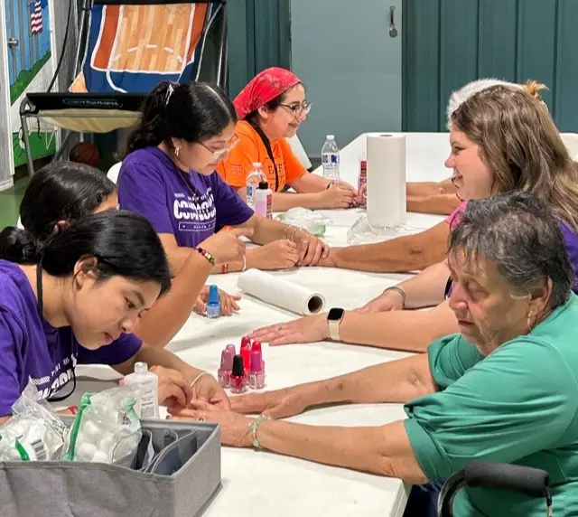 07.25.HispanicYouthfingernail painting ministry